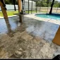 a floor made of travertine tiles that are freshly sealed